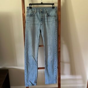 Levi 501’s, high rise, straight leg jeans.